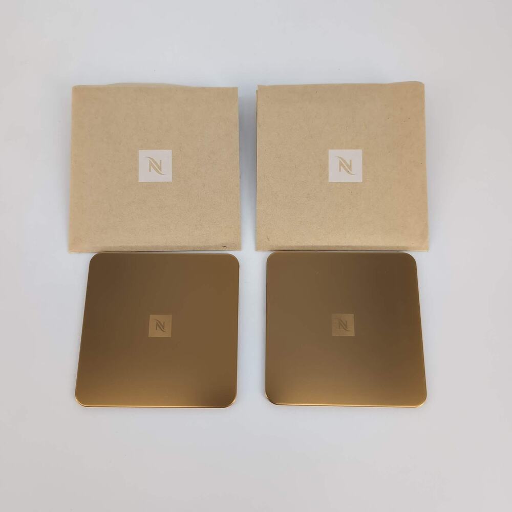 TWO Nespresso Barista Square Bronze Colored Recycled Aluminum Cork Coasters NEW